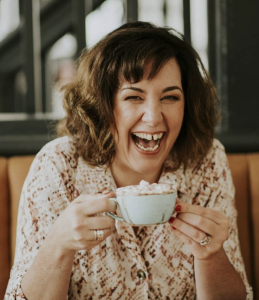 Helen Jubb Celebrant Helen drinking coffee with a smile